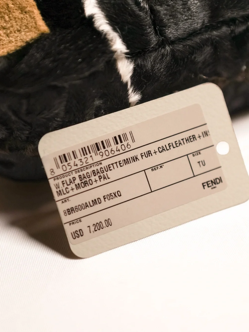 Fendi Fur Logo Baguette bag with black leather trim NWT